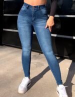 JEANS CLASICO AZUL LISO CON BIGOTES LASER