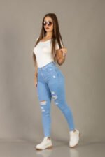 PANTALON CHUPIN CELESTE CON ROTURAS - Imagen 3