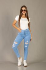 PANTALON CHUPIN CELESTE CON ROTURAS - Imagen 5