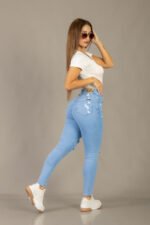 PANTALON CHUPIN CELESTE CON ROTURAS - Imagen 6