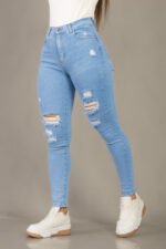 PANTALON CHUPIN CELESTE CON ROTURAS - Imagen 2